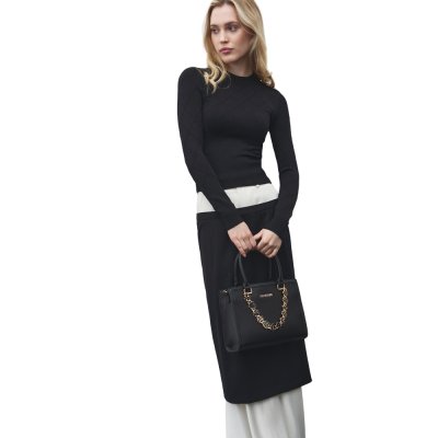 THE DANGLING HANDBAG